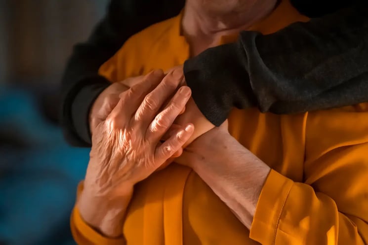 People embracing and holding hands