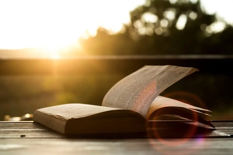 An open book at sunset