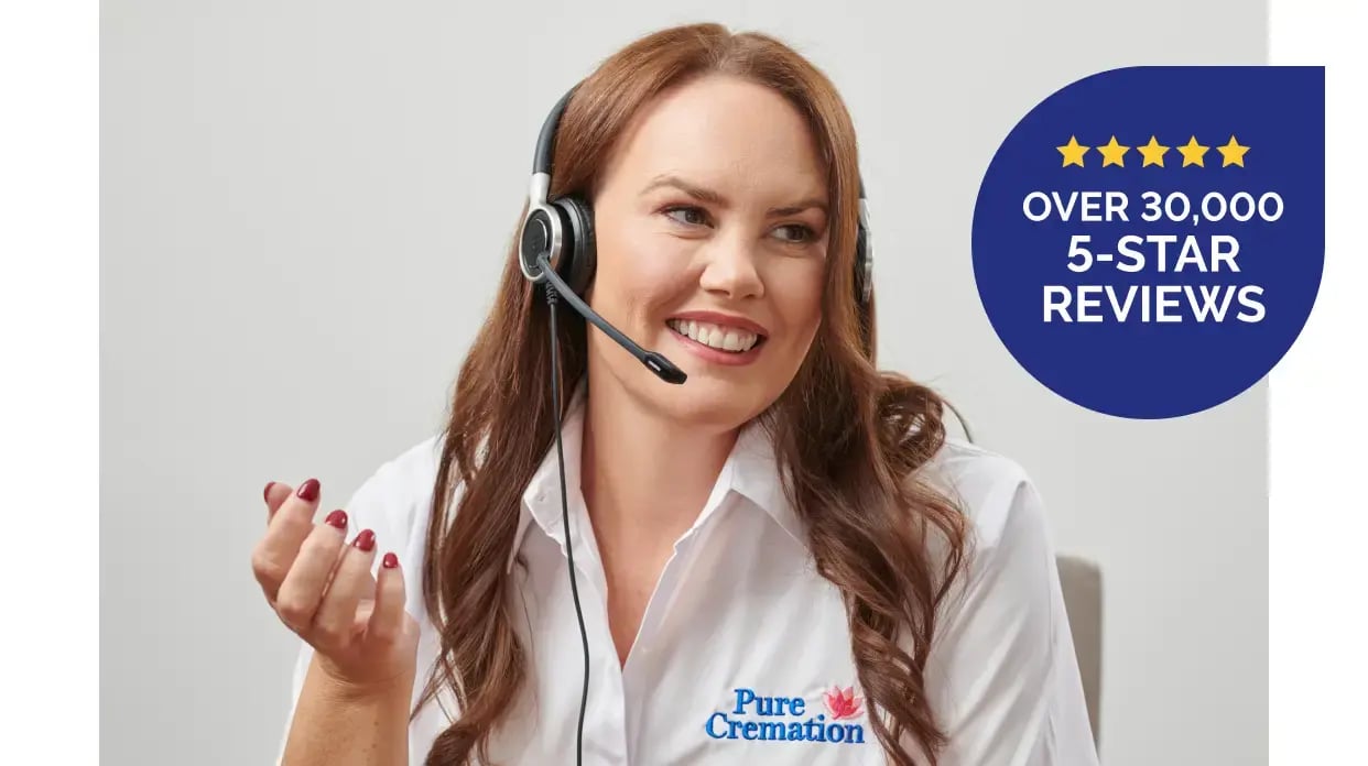 Pure Cremation's Kelly wearing a headset