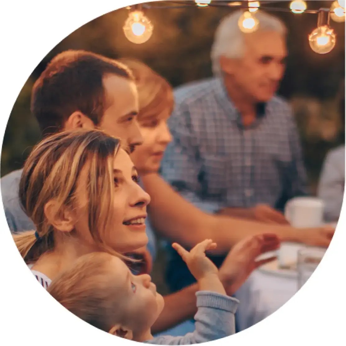 Family talking over dinner.