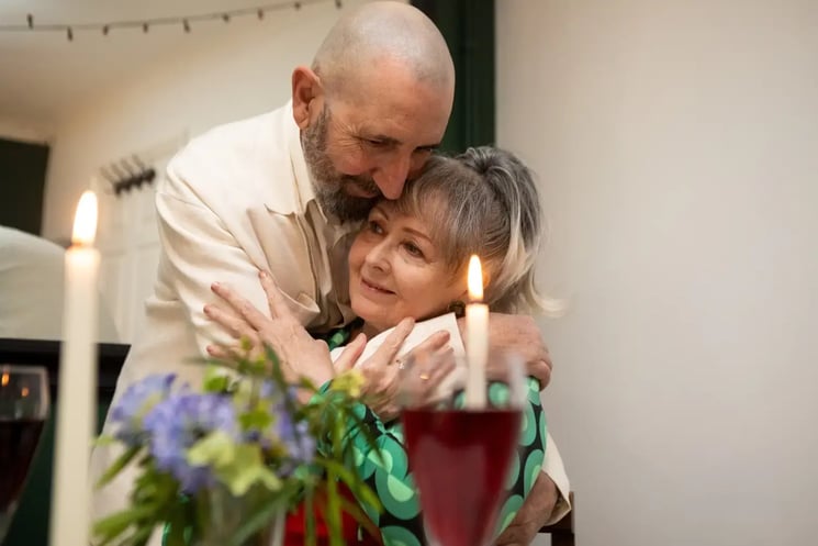 A man and woman hugging