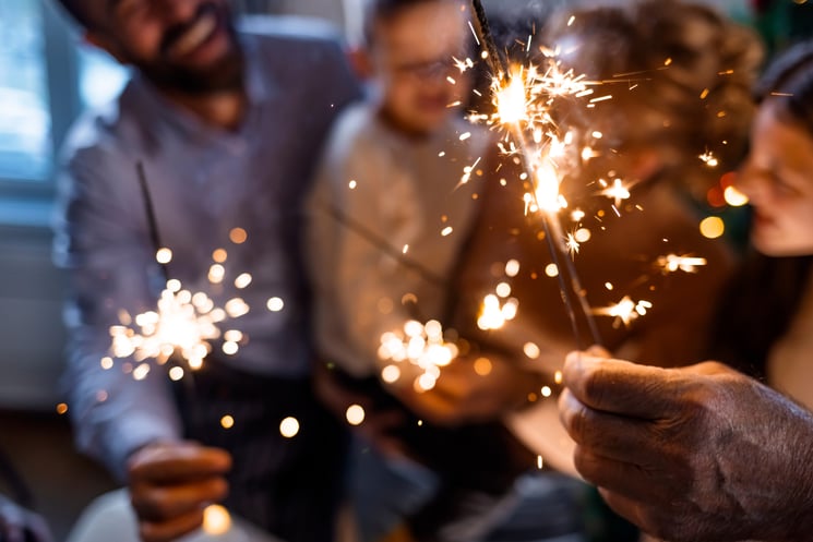 A group of people with sparklers