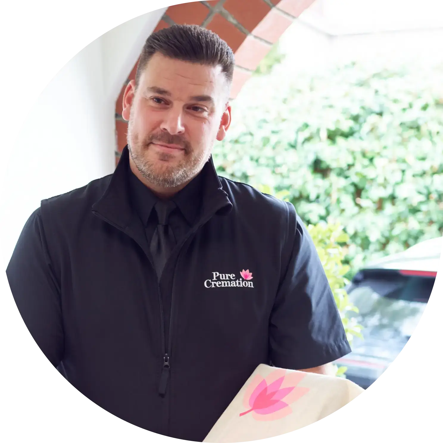 A Pure Cremation employee returns the ashes by hand A Pure Cremation employee returns the ashes by hand